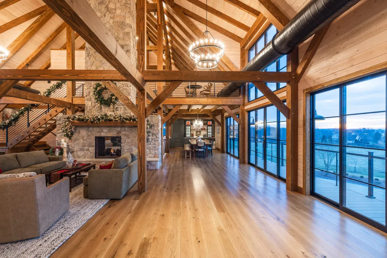Timber frame covered porch with stone fireplace, custom estate home Loudoun County Virginia